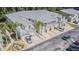 Community view with lush landscaping and lake at 1817 Hammocks Ave # 1817, Lutz, FL 33549