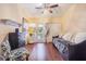 Bright bedroom with daybed and access to balcony at 1817 Hammocks Ave # 1817, Lutz, FL 33549
