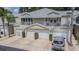 Three-unit building with attached garages at 1817 Hammocks Ave # 1817, Lutz, FL 33549