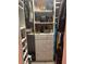Well-organized walk-in closet with ample shelving and drawers at 1817 Hammocks Ave # 1817, Lutz, FL 33549