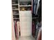 Spacious walk-in closet with custom shelving and drawers at 1817 Hammocks Ave # 1817, Lutz, FL 33549