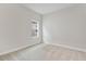 Simple bedroom with neutral wall paint and carpeted floors at 6257 Hidden Branch Dr, Apollo Beach, FL 33572