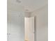 Bright bedroom with neutral walls, doors to closet and hallway at 6257 Hidden Branch Dr, Apollo Beach, FL 33572