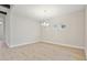 Bright dining room with chandelier and hardwood floors at 6257 Hidden Branch Dr, Apollo Beach, FL 33572