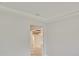 Open doorway revealing a room with wood beams at 6257 Hidden Branch Dr, Apollo Beach, FL 33572