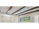 Spacious living room with high ceilings and wood beams at 6257 Hidden Branch Dr, Apollo Beach, FL 33572