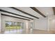 Living room with hardwood floors and sliding glass doors at 6257 Hidden Branch Dr, Apollo Beach, FL 33572