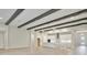 Open living space with kitchen and hardwood floors at 6257 Hidden Branch Dr, Apollo Beach, FL 33572