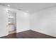 Bedroom with hardwood floors and ensuite bathroom at 2442 W Mississippi Ave # 6, Tampa, FL 33629