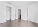 Spacious bedroom with hardwood floors and large closets at 2442 W Mississippi Ave # 6, Tampa, FL 33629