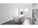 Bright dining area with marble table and transparent chairs at 2442 W Mississippi Ave # 6, Tampa, FL 33629