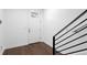 Modern entryway with hardwood floors and staircase at 2442 W Mississippi Ave # 6, Tampa, FL 33629