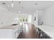 Modern kitchen with island and stainless steel appliances at 2442 W Mississippi Ave # 6, Tampa, FL 33629