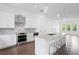 Modern kitchen with stainless steel appliances and white cabinetry at 2442 W Mississippi Ave # 6, Tampa, FL 33629