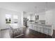 Modern kitchen with stainless steel appliances and white cabinetry at 2442 W Mississippi Ave # 6, Tampa, FL 33629