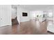Open concept kitchen and living area with hardwood floors at 2442 W Mississippi Ave # 6, Tampa, FL 33629