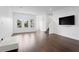 Spacious living room with hardwood floors and natural light at 2442 W Mississippi Ave # 6, Tampa, FL 33629