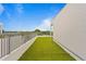 Relaxing rooftop deck with artificial grass and city views at 2442 W Mississippi Ave # 6, Tampa, FL 33629