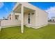 Private rooftop deck with artificial turf and covered patio area at 2442 W Mississippi Ave # 6, Tampa, FL 33629