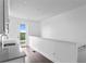 Modern wet bar with a gray quartz countertop and stainless steel sink at 2442 W Mississippi Ave # 6, Tampa, FL 33629