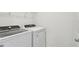 Bright laundry room with washer and dryer at 10627 Hidden Banks Gln, Parrish, FL 34219