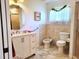 Well-appointed bathroom with walk-in shower and bidet at 13417 Whitehaven Ct, Spring Hill, FL 34609