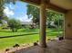 Spacious screened porch overlooking a lush green backyard at 13417 Whitehaven Ct, Spring Hill, FL 34609