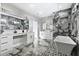Large, updated bathroom features dual sinks, stylish mirrors, and modern fixtures throughout the space at 2724 W Dewey St, Tampa, FL 33607