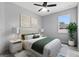 Cozy bedroom with neutral tones, soft lighting, and a serene ambiance at 2724 W Dewey St, Tampa, FL 33607