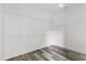 Walk-in closet with white wire shelving for ample storage space and organization at 2724 W Dewey St, Tampa, FL 33607
