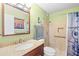 Clean bathroom with walk-in shower and granite vanity at 1528 Chevy Chase Dr, Sun City Center, FL 33573