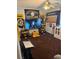 Steelers-themed game room with a large TV and comfy seating at 1528 Chevy Chase Dr, Sun City Center, FL 33573