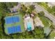 Community pool, tennis courts, and basketball court are featured at 568 Shoreham Ne Ct, St Petersburg, FL 33716
