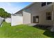 Private backyard with patio and grassy area at 568 Shoreham Ne Ct, St Petersburg, FL 33716