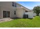 Private fenced backyard with patio and grassy area at 568 Shoreham Ne Ct, St Petersburg, FL 33716
