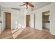 Spacious bedroom with wood flooring and ceiling fan at 568 Shoreham Ne Ct, St Petersburg, FL 33716