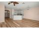 Bright dining room with a farmhouse table and chairs, adjacent to kitchen at 568 Shoreham Ne Ct, St Petersburg, FL 33716
