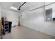 Garage with overhead door and extra space at 568 Shoreham Ne Ct, St Petersburg, FL 33716