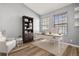 Home office with built-in shelving and wood-look floors at 568 Shoreham Ne Ct, St Petersburg, FL 33716