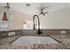 Modern kitchen sink and faucet with granite countertop at 568 Shoreham Ne Ct, St Petersburg, FL 33716