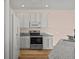Modern kitchen with granite countertops and stainless steel appliances at 568 Shoreham Ne Ct, St Petersburg, FL 33716
