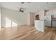 Spacious living room with light walls and wood-look floors at 568 Shoreham Ne Ct, St Petersburg, FL 33716