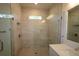 Modern bathroom with a large walk-in shower, tile flooring, and a vanity at 3221 20Th N St, St Petersburg, FL 33713