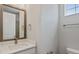 Clean bathroom with single vanity and a window at 3221 20Th N St, St Petersburg, FL 33713