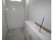 Bathroom with white subway tile and a white vanity at 3221 20Th N St, St Petersburg, FL 33713