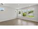 Bright living room featuring hardwood floors and large windows at 3221 20Th N St, St Petersburg, FL 33713