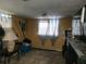 Needs renovation, currently has damaged walls and flooring at 1716 Lancelot Loop, Tampa, FL 33619