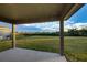 Covered patio overlooking a spacious backyard at 16115 69Th Lane E Pl, Parrish, FL 34219
