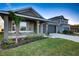 Two-story home with gray siding and landscaping, two car garage at 16115 69Th Lane E Pl, Parrish, FL 34219