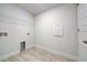 Laundry room with vinyl flooring and built-in shelving at 16115 69Th Lane E Pl, Parrish, FL 34219